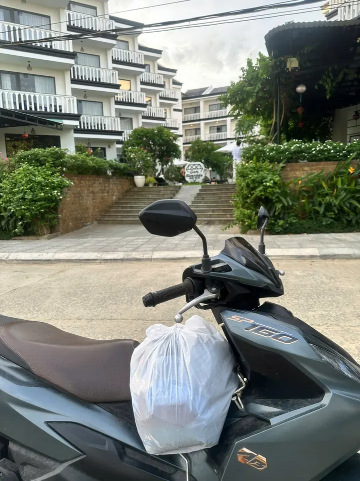 May Laundry order on a delivery round in Hoi An